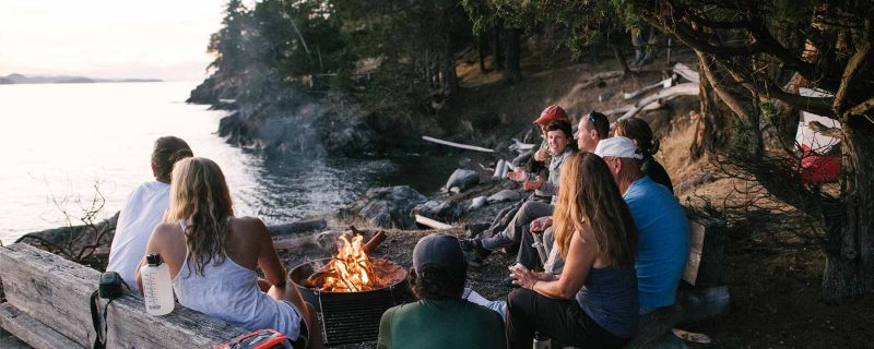 Group of campers enjoying the campfire